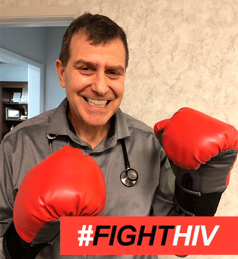 hiv doctor stephen renae wearing boxing gloves